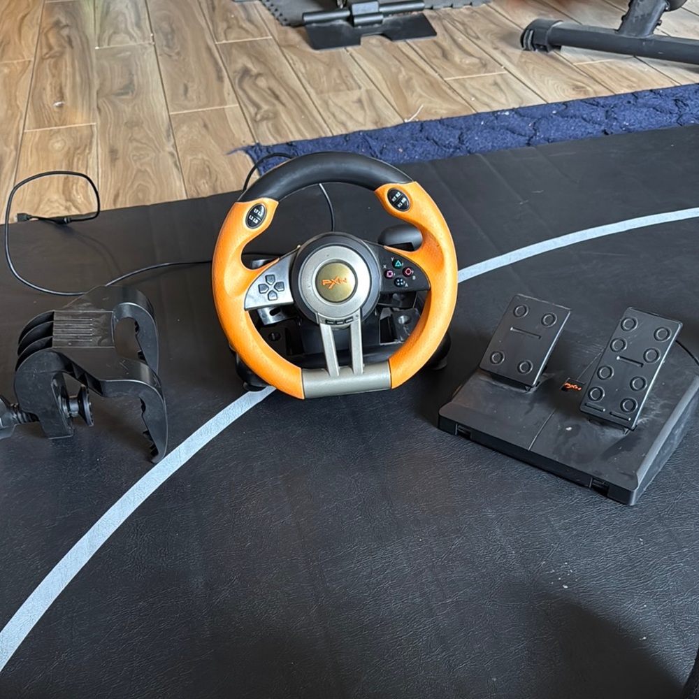 Orange and Black Racing Wheel with Pedals